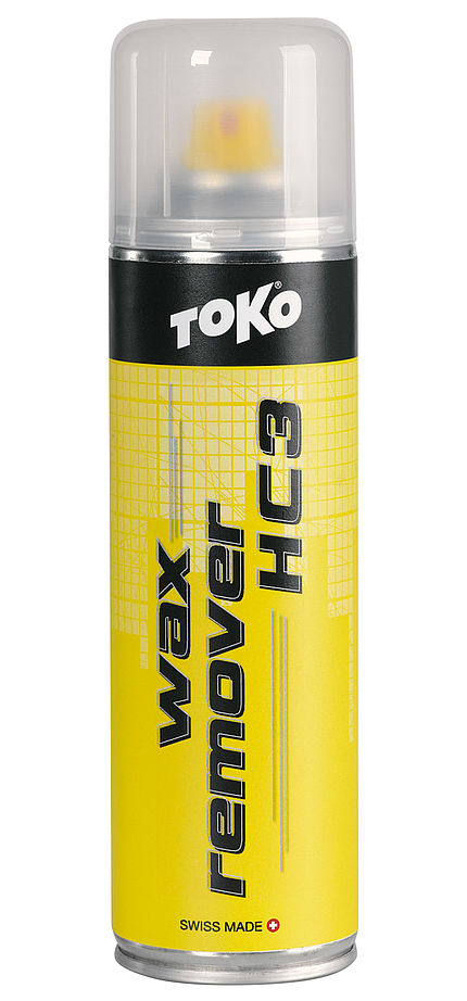 Toko Wax Remover Gelb Gelbe Sprühdose Toko Wax Remover HC3 für Snowboard, mit transparentem Deckel. Schwarze Schrift auf gelbem Hintergrund.
