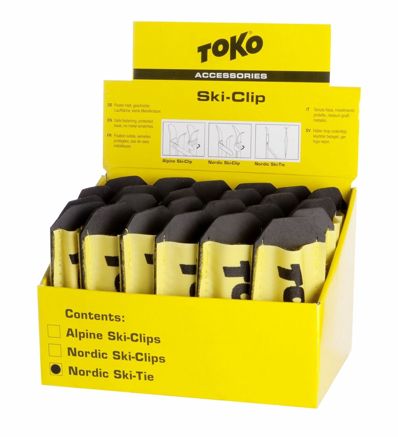 Gelbe Verkaufsverpackung mit Toko Nordic Ski Ties. Schwarze Polster schützen die Skibeläge.