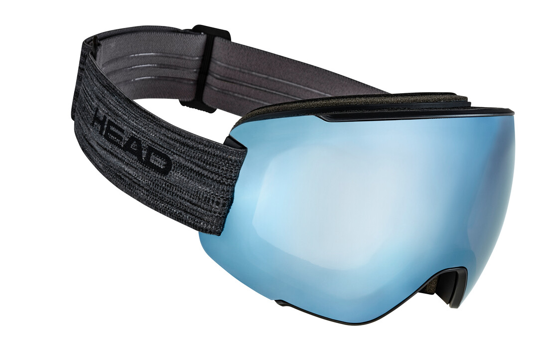 Masque de ski MAGNIFY 5K bleu Masque de ski MAGNIFY 5K blue KORE avec bandeau gris et écran torique réfléchissant bleuté.