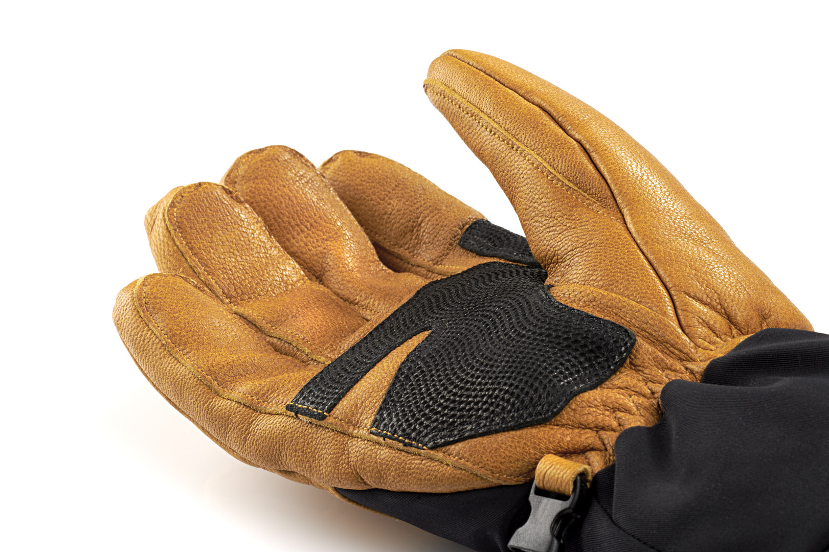 Thermic Freeride Handschuh Nahaufnahme eines braunen Therm-ic Freeride Ultra Heat Handschuhs mit schwarzer Verstärkung auf der Handfläche.