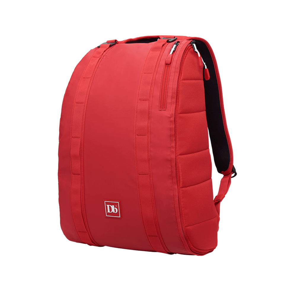 Sac à dos rouge Douchebags The Base 15L, fermetures éclair latérales, bretelles et logo.