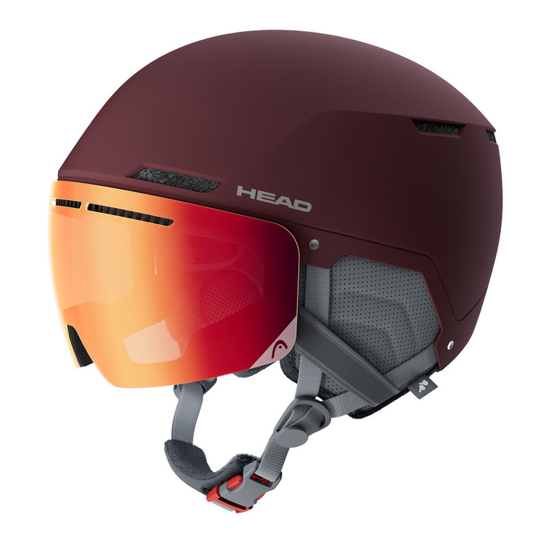Burgunderfarbener Head Cinema Pro W Visierhelm mit orangefarbenem Visier im Profil.