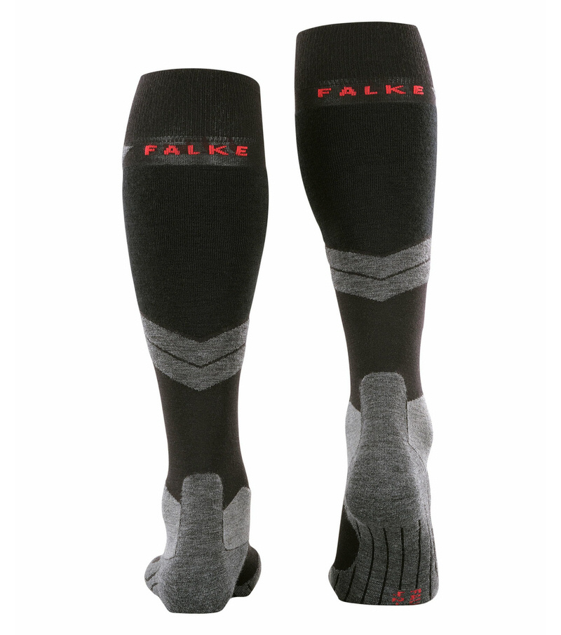 Zwei schwarze Falke SK4 Wool Skiing Kniestrümpfe von hinten gezeigt. Rote Logos und graue Akzente sind sichtbar.