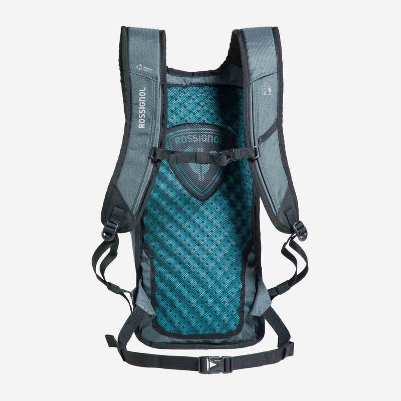 Grauer Rossignol Rucksack Grauer Rossignol Escaper Active 8L Rucksack von hinten, mit blauem Netzrücken und schwarzen Gurten.