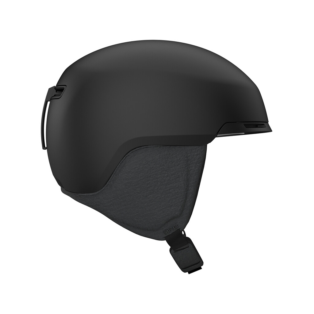 Mattschwarzer Giro Tagert MIPS Skihelm, Seitenansicht. Details von Ohrpads und Kinnriemen sichtbar.