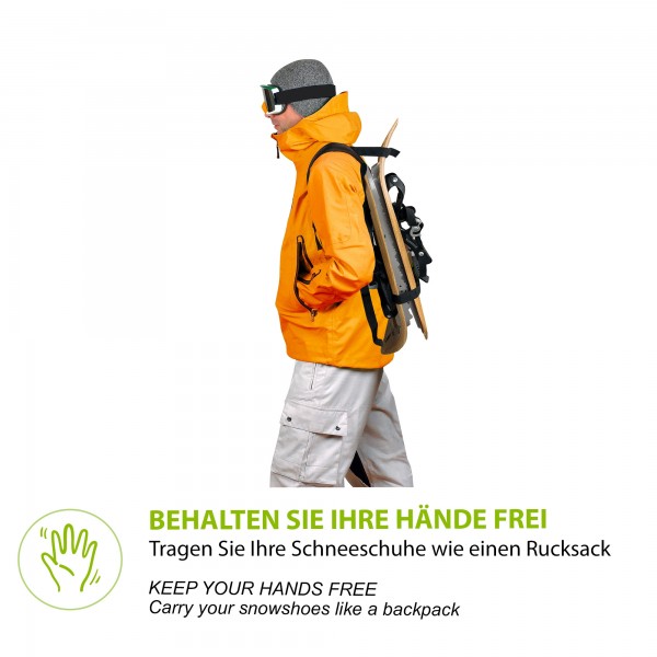 Schneeschuhtrage-Rucksack Person mit Schneeschuhen auf dem Rücken, getragen mit dem Raq Back Schneeschuhtrage-Rucksack.