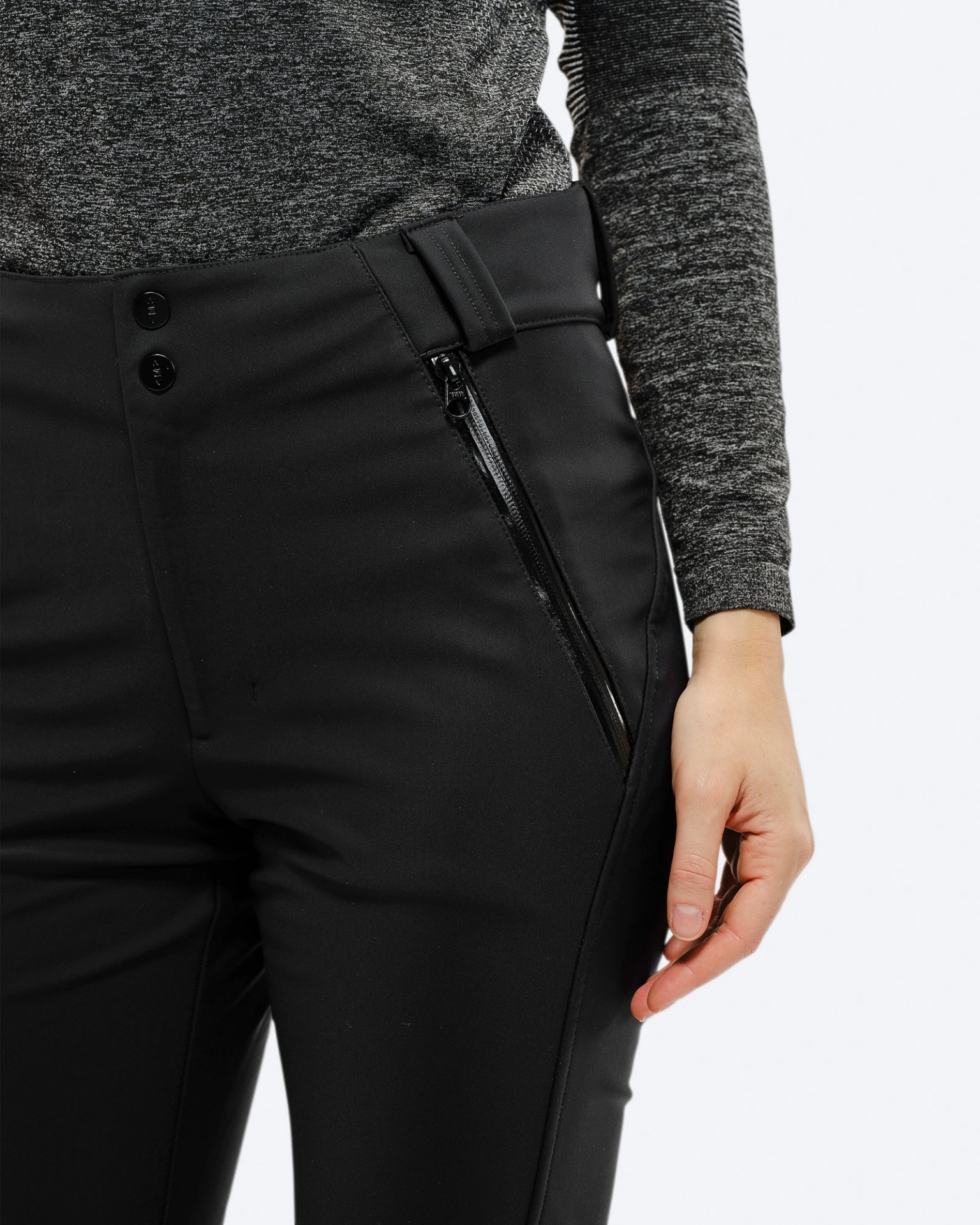 Schwarze Stretch Ski Pants Detailaufnahme der schwarzen Stretch Ski Pants mit Taschenreißverschluss und Bund.