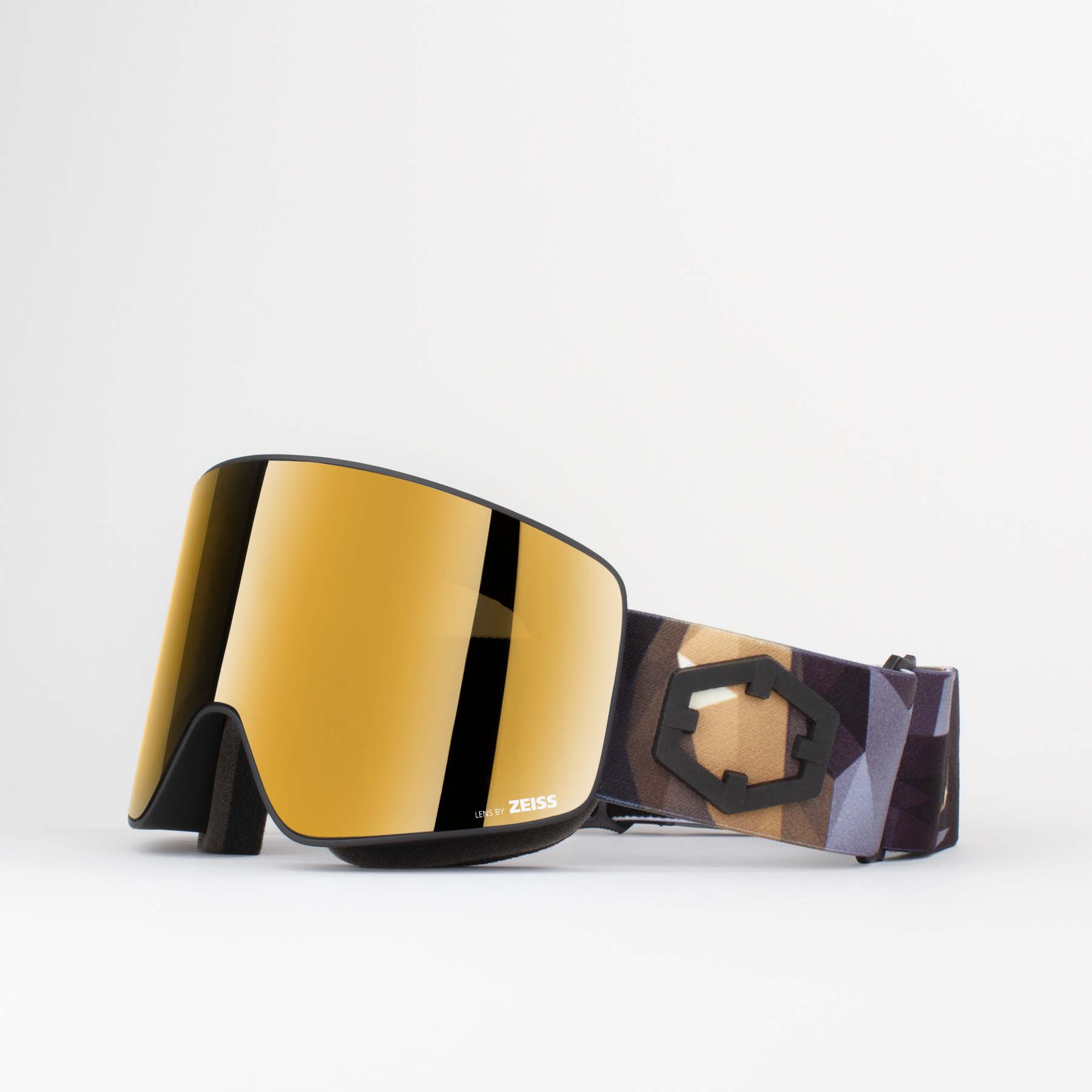 Goldene Out Of Void Origami Skibrille mit zylindrischer Zeiss Linse und gemustertem Kopfband.