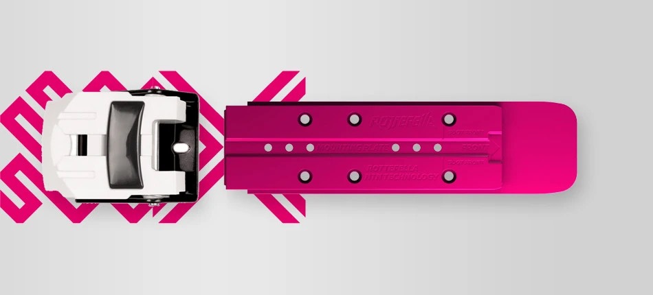 NTN Freeride Heel Kit: Detailansicht der Montageplatte und des Fersenstücks. Das Fersenstück ist weiß und schwarz, die Platte ist pink.