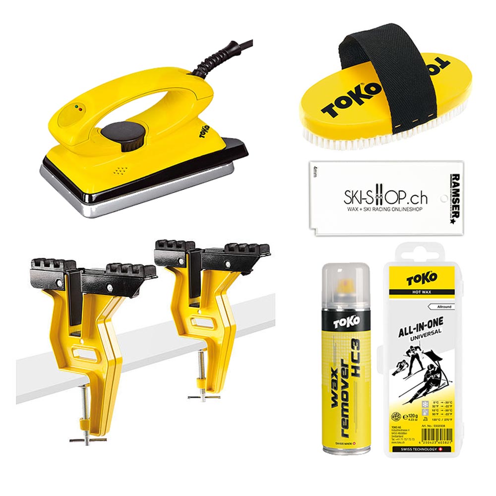 Gelbes Toko Starter Set Snowboard: Wachsgerät, Bürste, Halterung, Skiwachs, Plexi Blade, Wax Remover und Belagsreparaturstift.